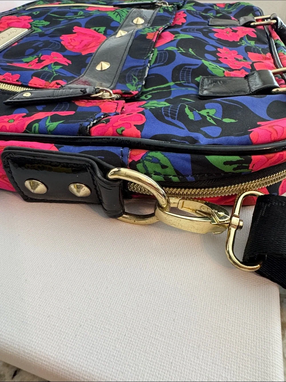 Betsey Johnson Blue Floral Skull Laptop Bag with Pink and Green Accents